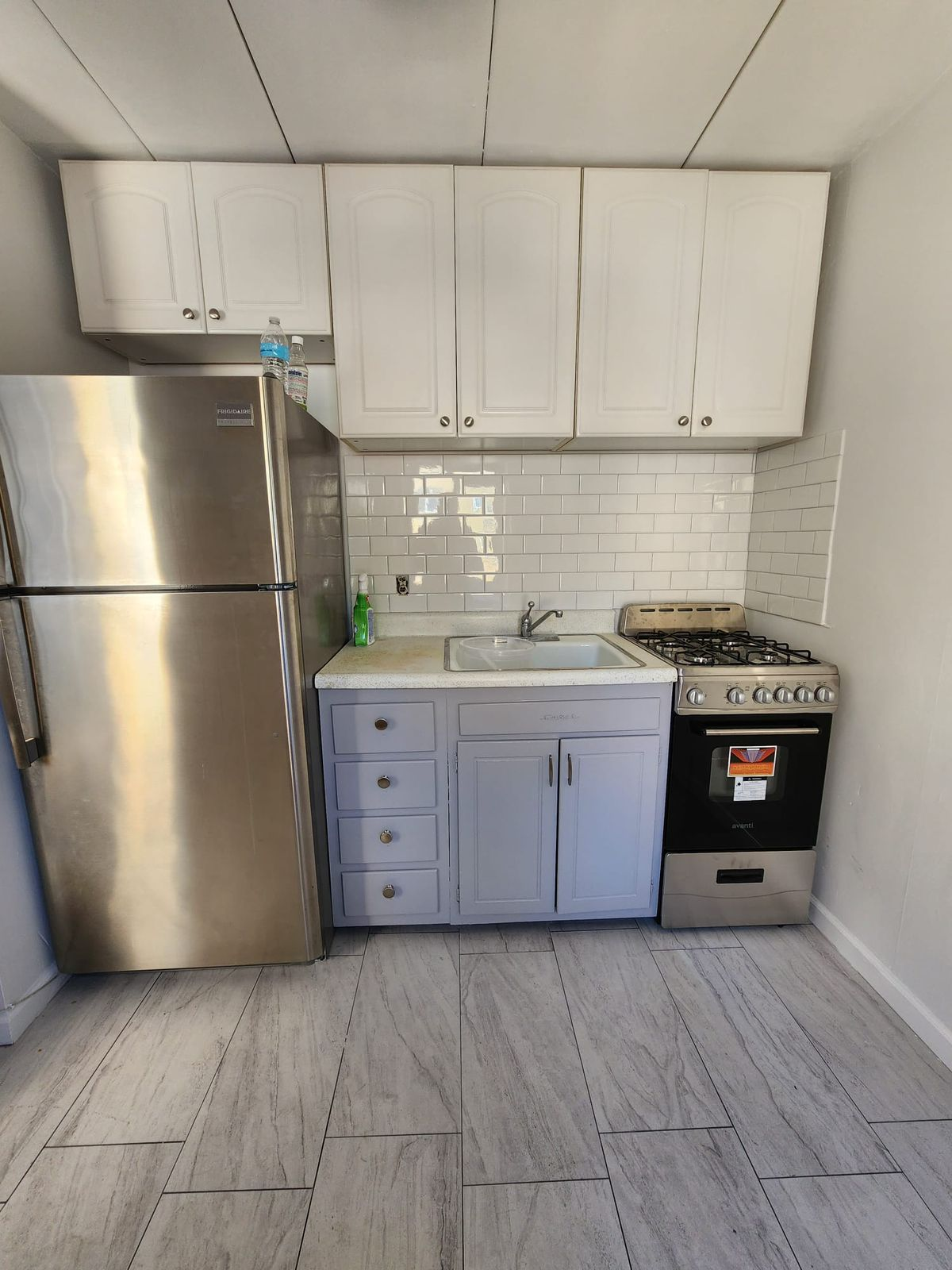 kitchen remodeling Yonkers NY after photo by AlbStar Renovation freshly painted modern cabinets