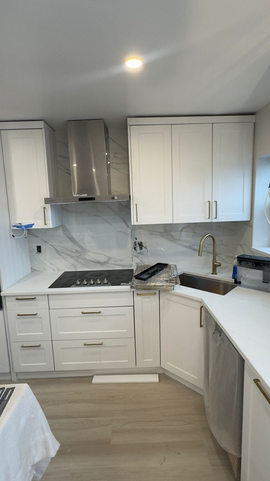 Home remodeling Queens NY by AlbStar Renovation — white marble kitchen renovation result
