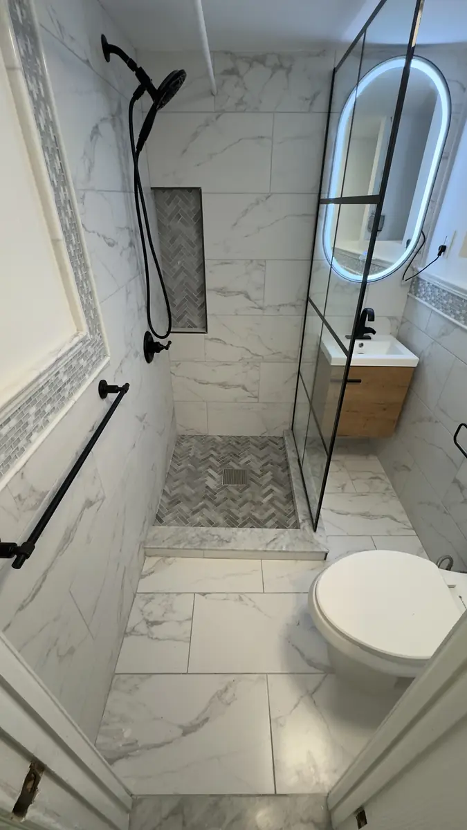 Bathroom renovation Bronx NY — after photo showing luxury marble bathroom by AlbStar Renovation