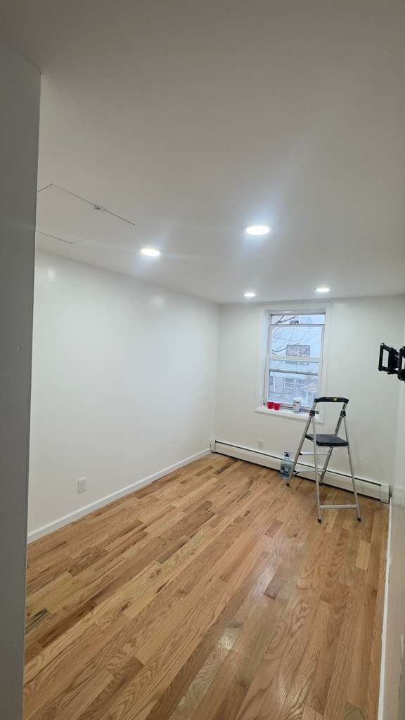 popcorn ceiling removal cost in Yonkers NY — smooth finished ceiling by AlbStar Renovation