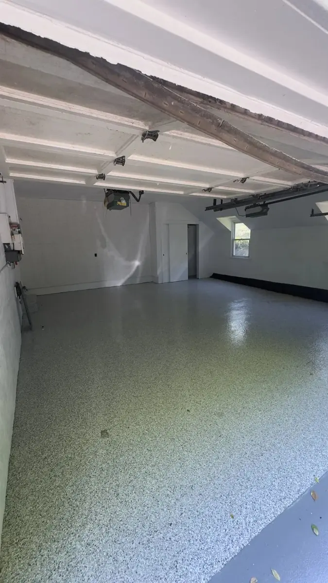 Epoxy flooring Westchester NY — after photo showing flake epoxy garage floor by AlbStar Renovation