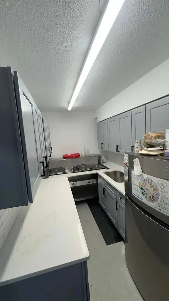 Kitchen remodeling Bronx NY — finished kitchen gray shaker cabinets quartz countertops by AlbStar Renovation