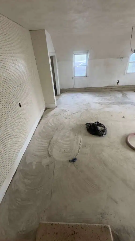 Garage floor prepared and primed for epoxy coating by AlbStar Renovation Yonkers NY